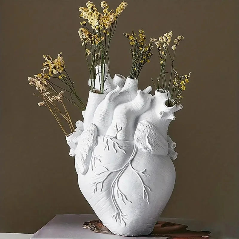 Add a touch of modern elegance to your space with our Heart Shape Resin Vase. Double Cart provides Best products for your home in Boston, MA.